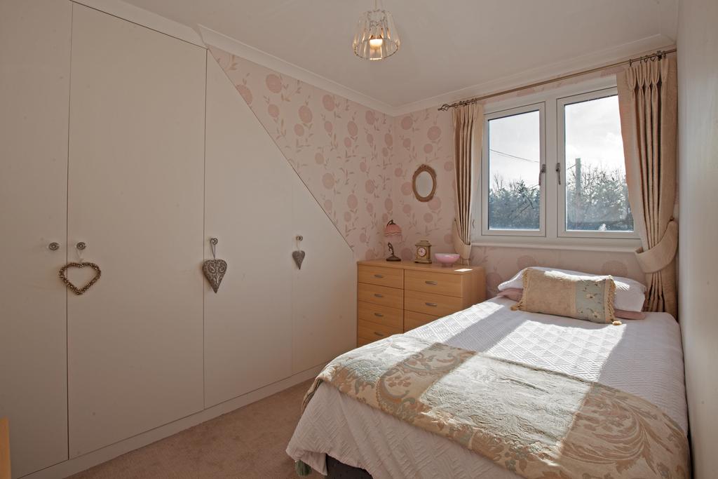 Bedroom Four with fitted Wardrobes