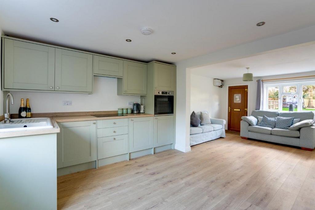 Open plan to sitting room