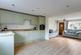 Open plan to sitting room