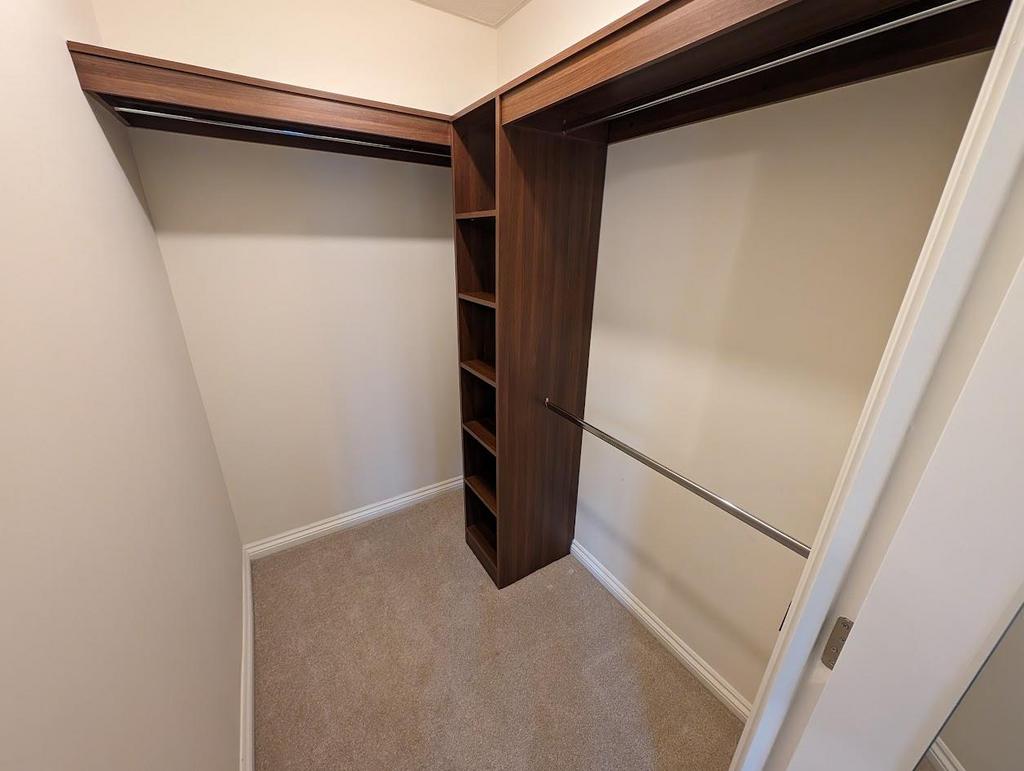 24 Trewin Lodge walkin wardrobe.jpg