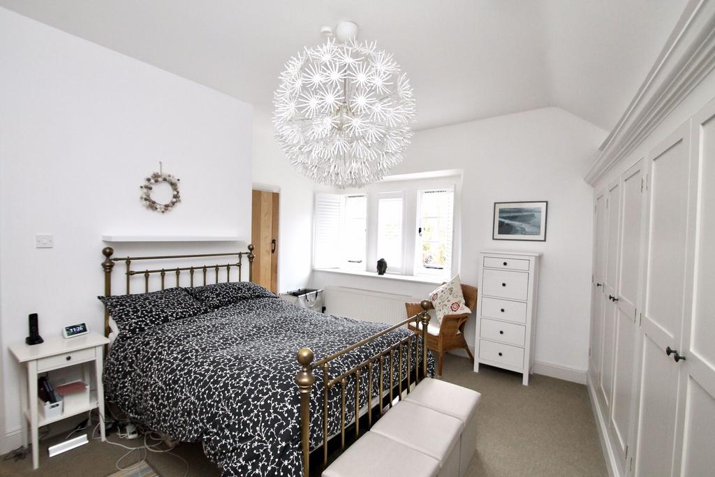 Bedroom one and fitted wardrobes