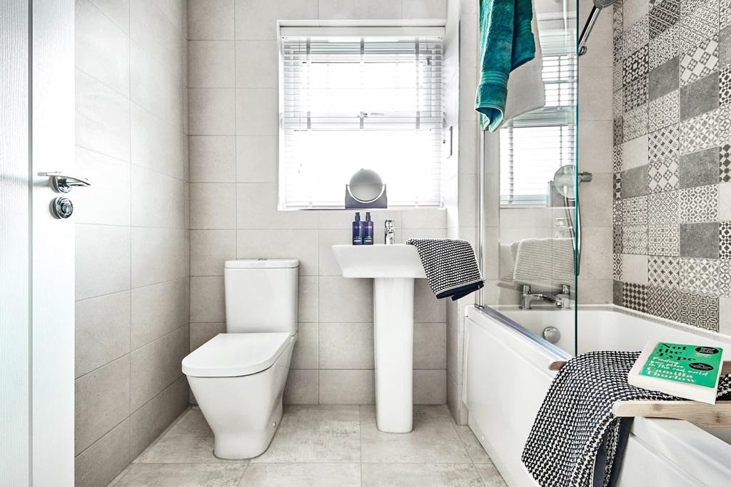 A sleek and contemporary family bathroom