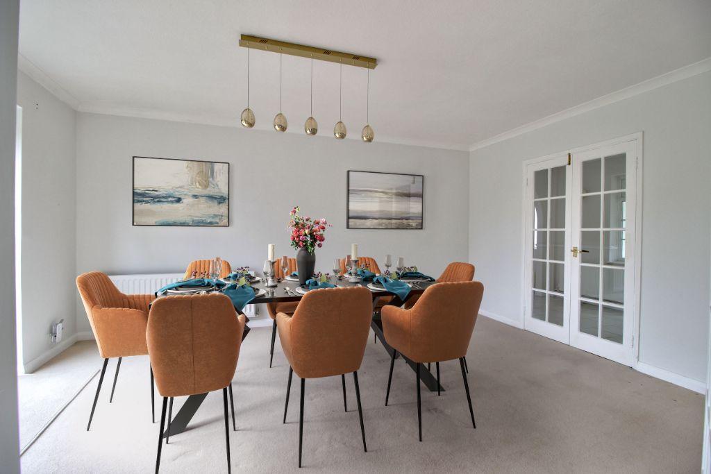 Dining room seen through double doors from living