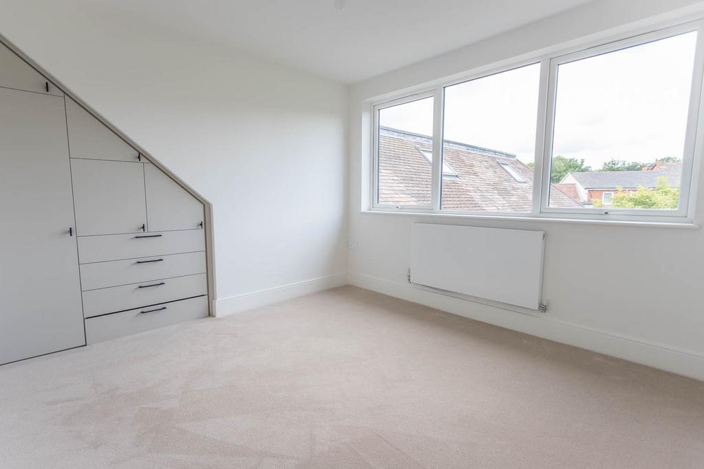 Bedroom with built in wardrobes