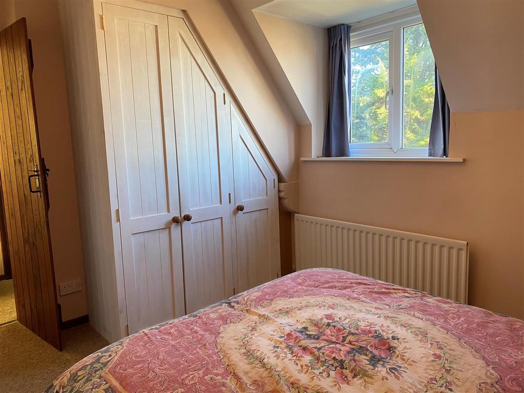 Main double bedroom, car park facing, built in war