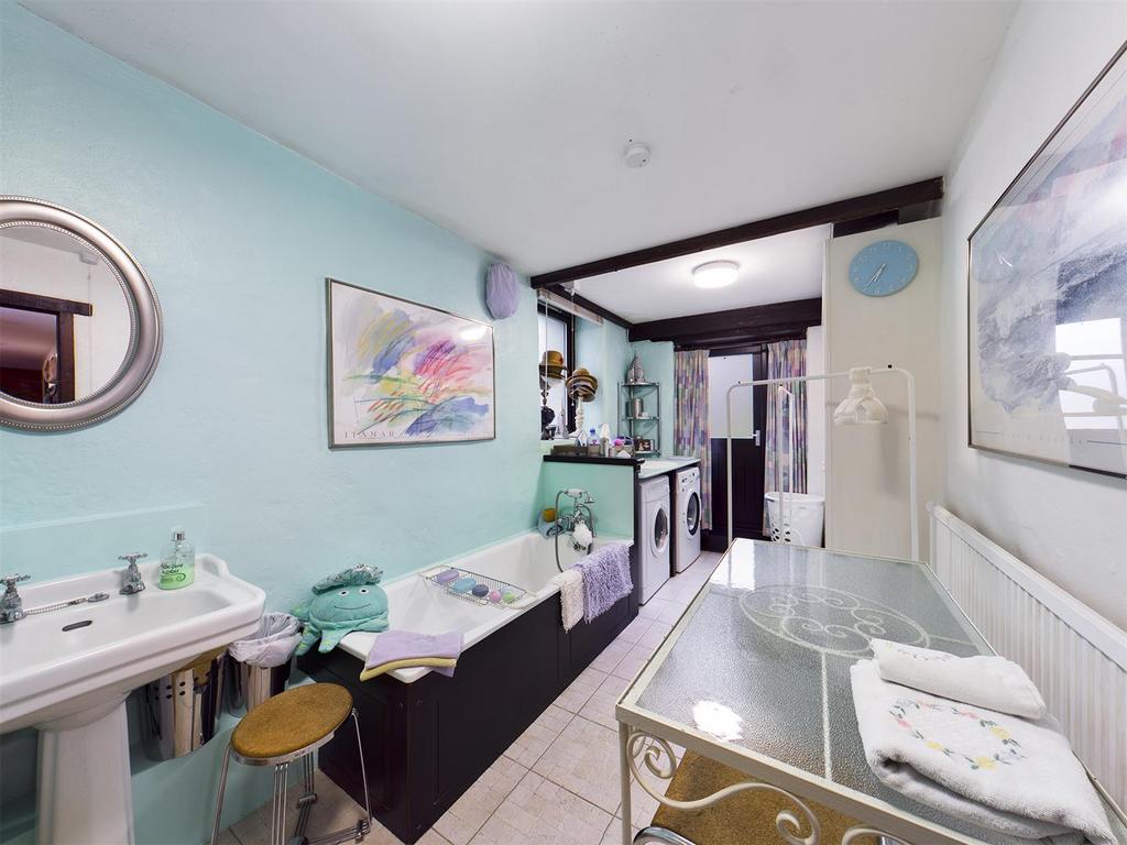 Utility Bathroom.