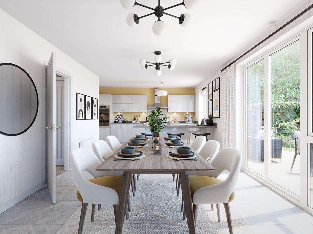 The open plan kitchen features a dining area...