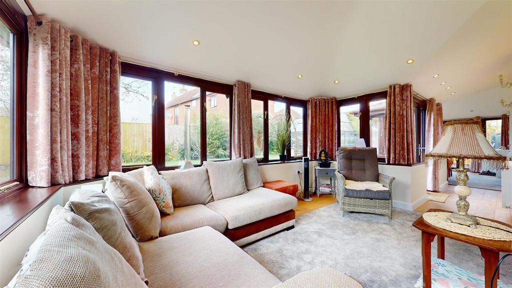 Tiled roof glazed conservatory