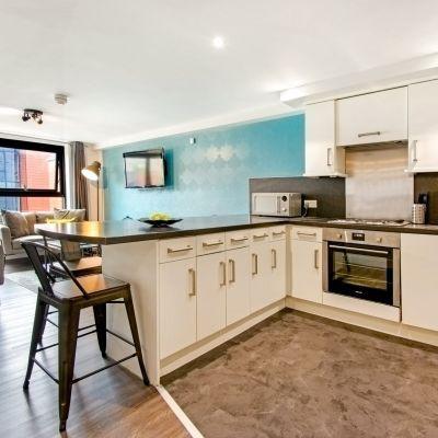 Kitchen area with breakfast bar