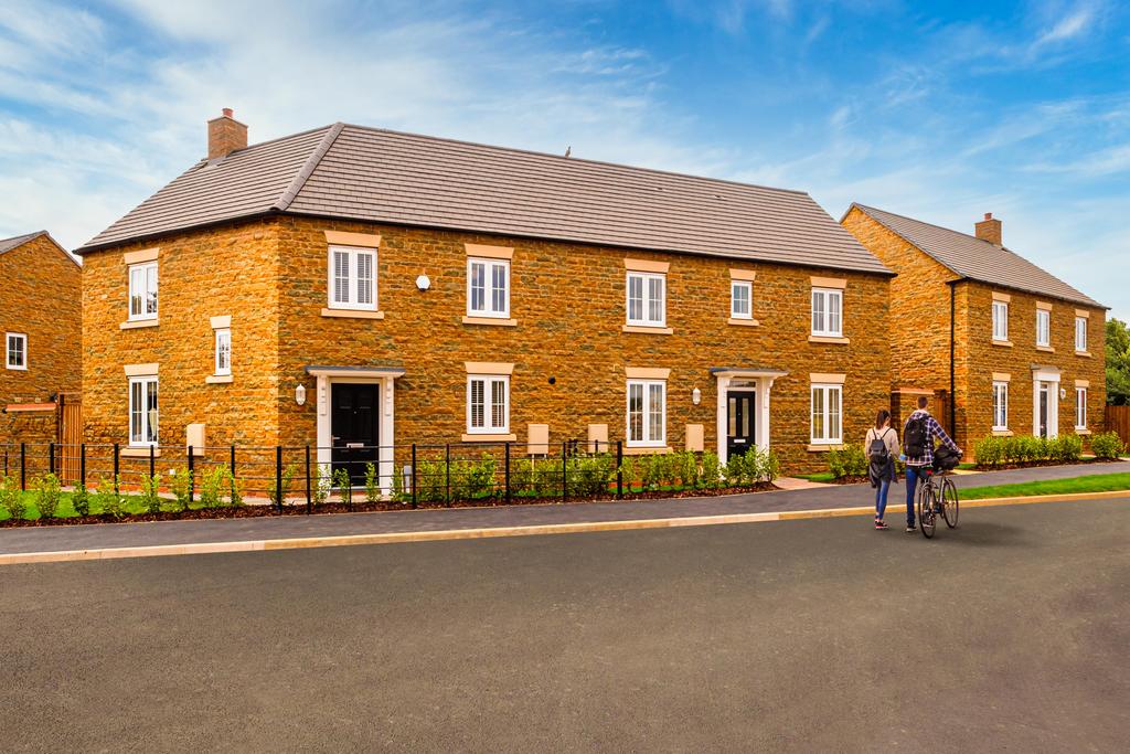 Photo of a yellow brick row of houses