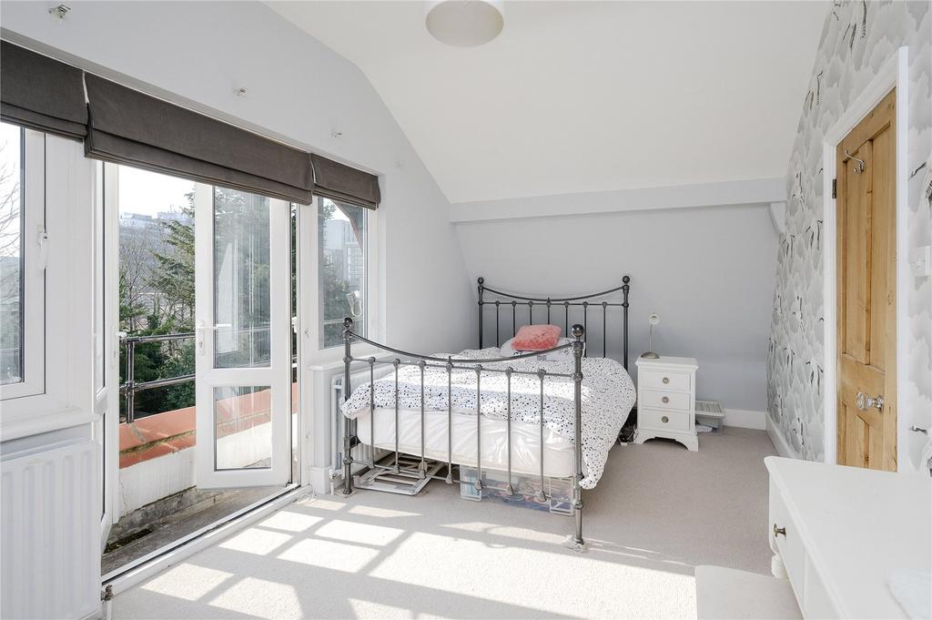 Bedroom With Balcony