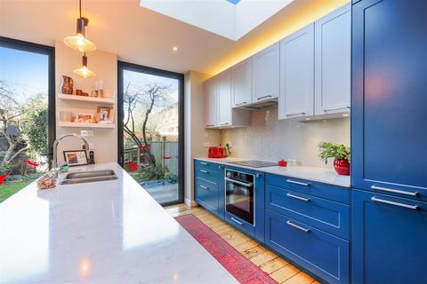 34 Faraday Road, London, SW19 8PD