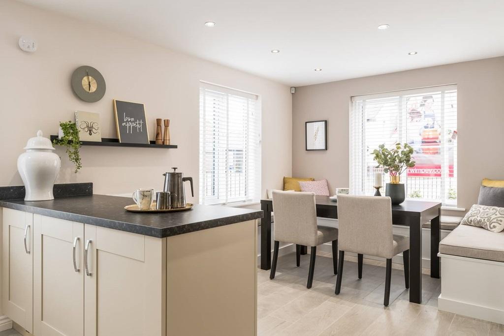 The open plan kitchen dining area makes cooking...