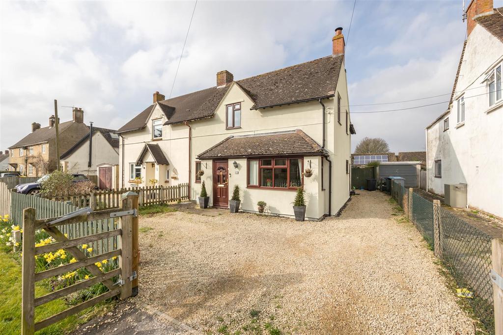 Frontage with gated driveway