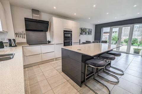 57 Lake Drive, Weldon, Corby, NN17 3FE