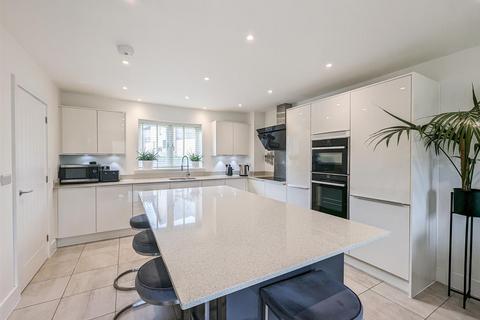 57 Lake Drive, Weldon, Corby, NN17 3FE