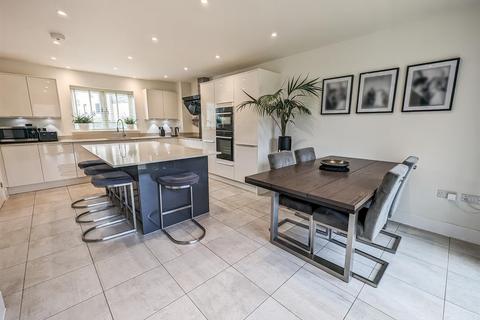 57 Lake Drive, Weldon, Corby, NN17 3FE