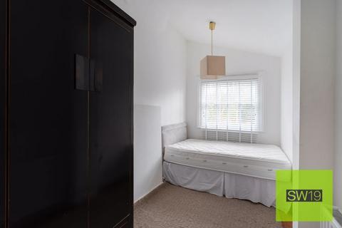 4a Mostyn Road, London, SW19 3LH