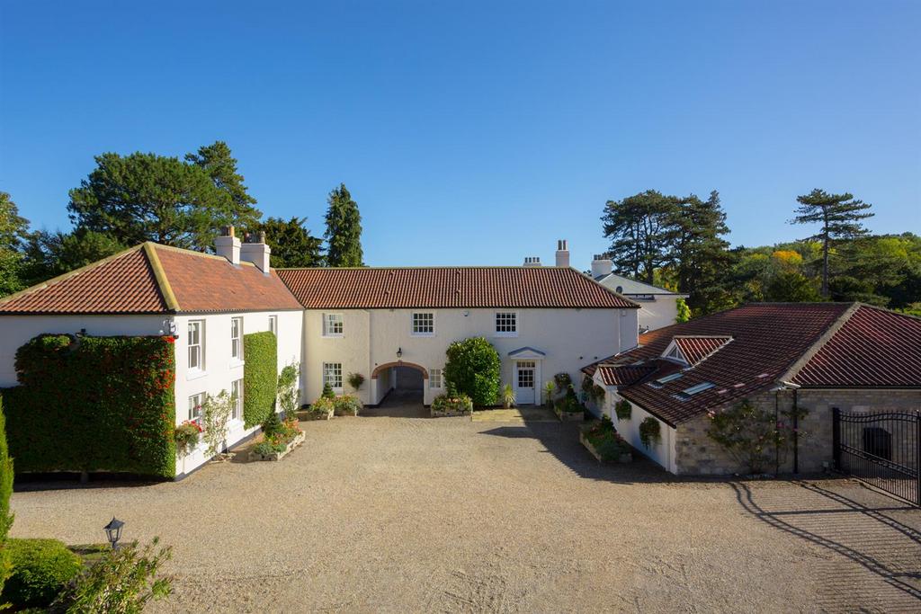 Entrance to house. Cottages on left.