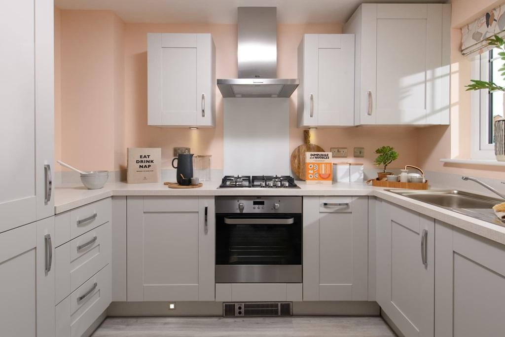 A 3 sided kitchen with ample storage