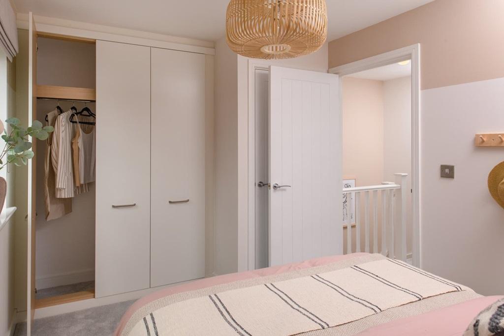 With a built in storage cupboard to the second...