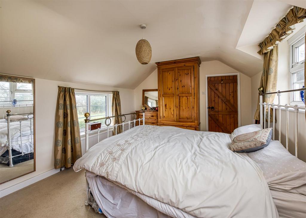 Greystoke Cottage-bed1.jpg
