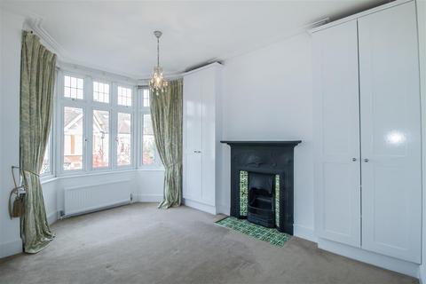 8 Stuart Road, London, SW19 8DH