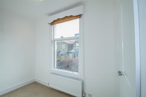 8 Stuart Road, London, SW19 8DH