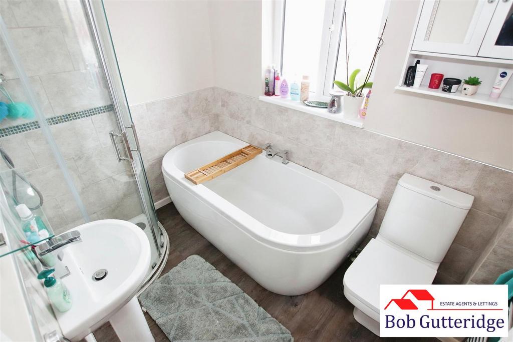 Modern four piece first floor bathroom