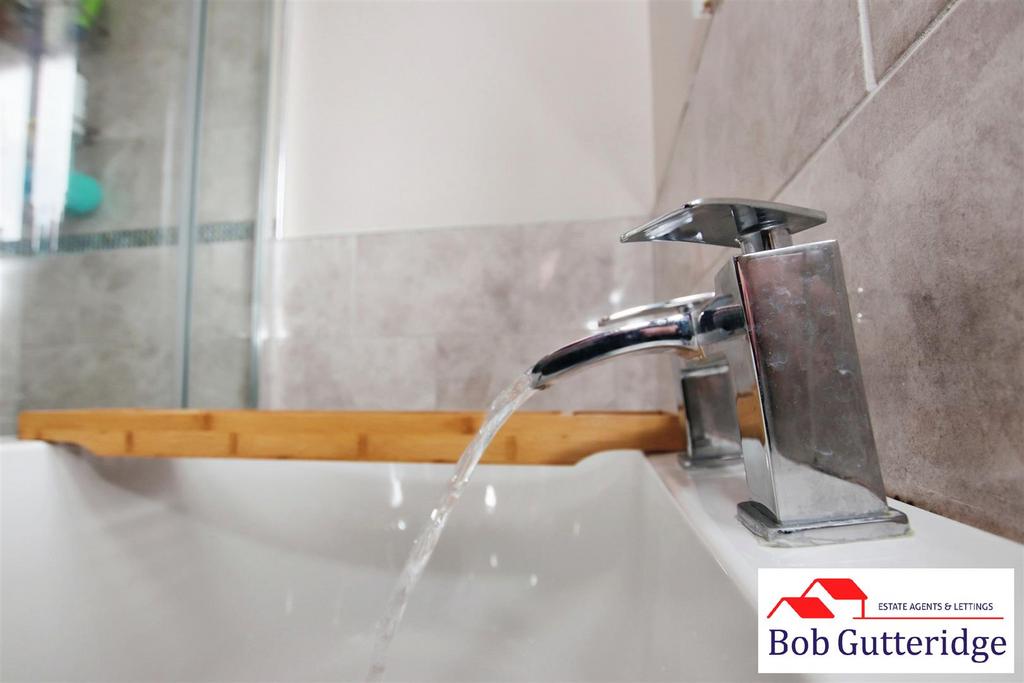 Modern four piece first floor bathroom