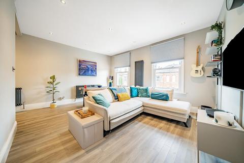 25a Alexandra Road, London, SW19 7JZ