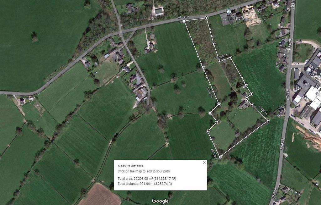 Google View of the plot and 7 acres approx.JPG