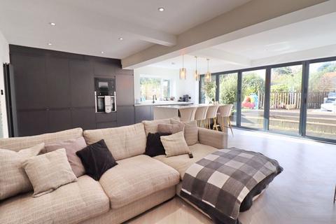 64 Birchfield Drive, Worsley, Manchester, M28 1ND