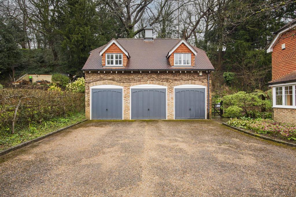 Triple Garage &amp; Office Above.