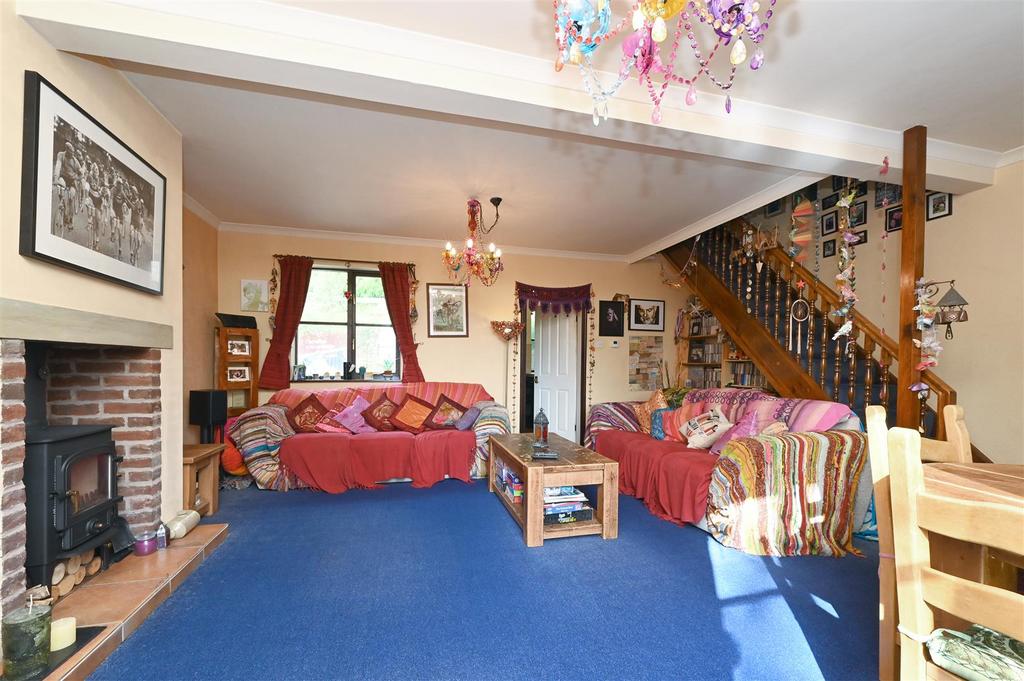 Living Room - fireplace and stairs.jpg