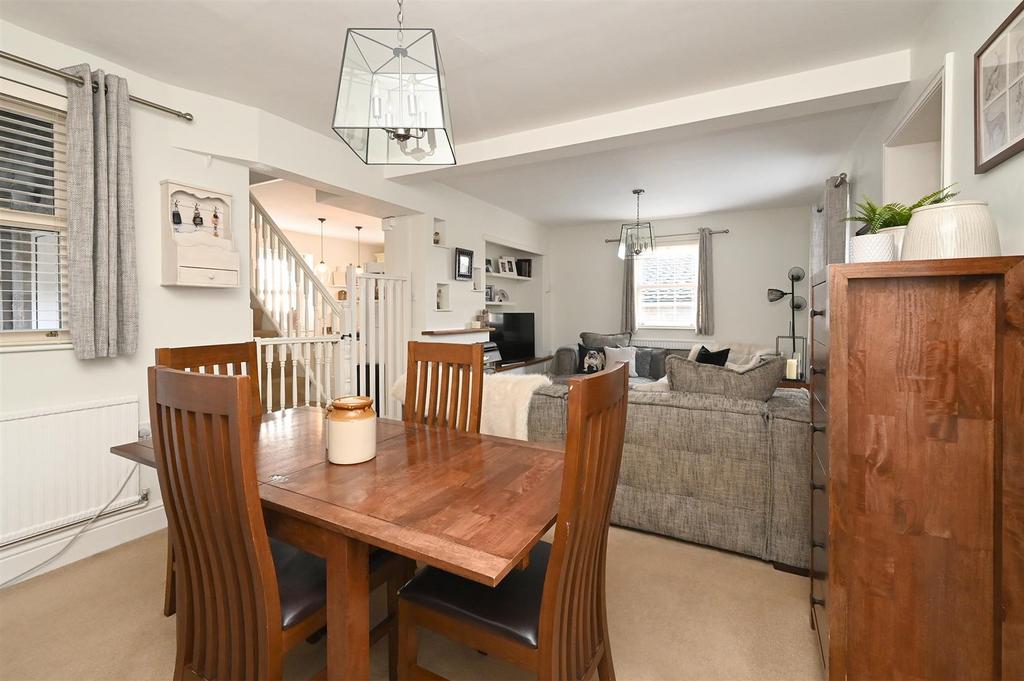 Dining area towards living room and kitchen.jpg