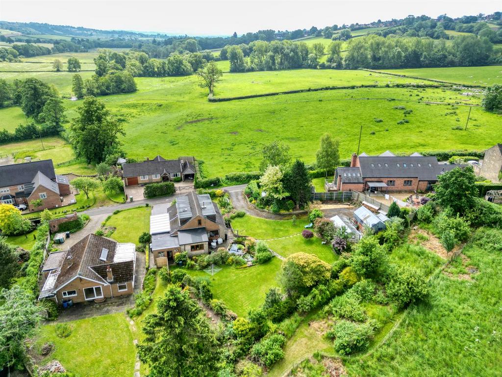 Drone - looking south from rear of the home.jpg