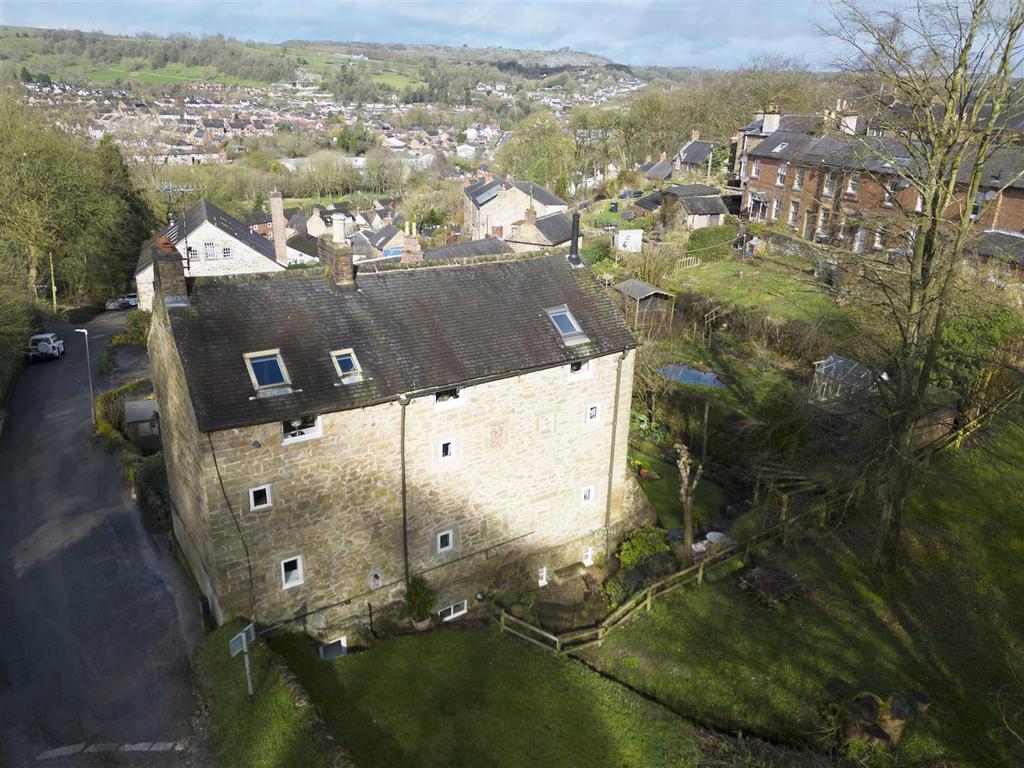 Rear of the home and view over Wirksworth.jpg