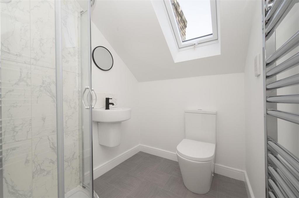 Bedroom Three - en-suite shower room.jpg