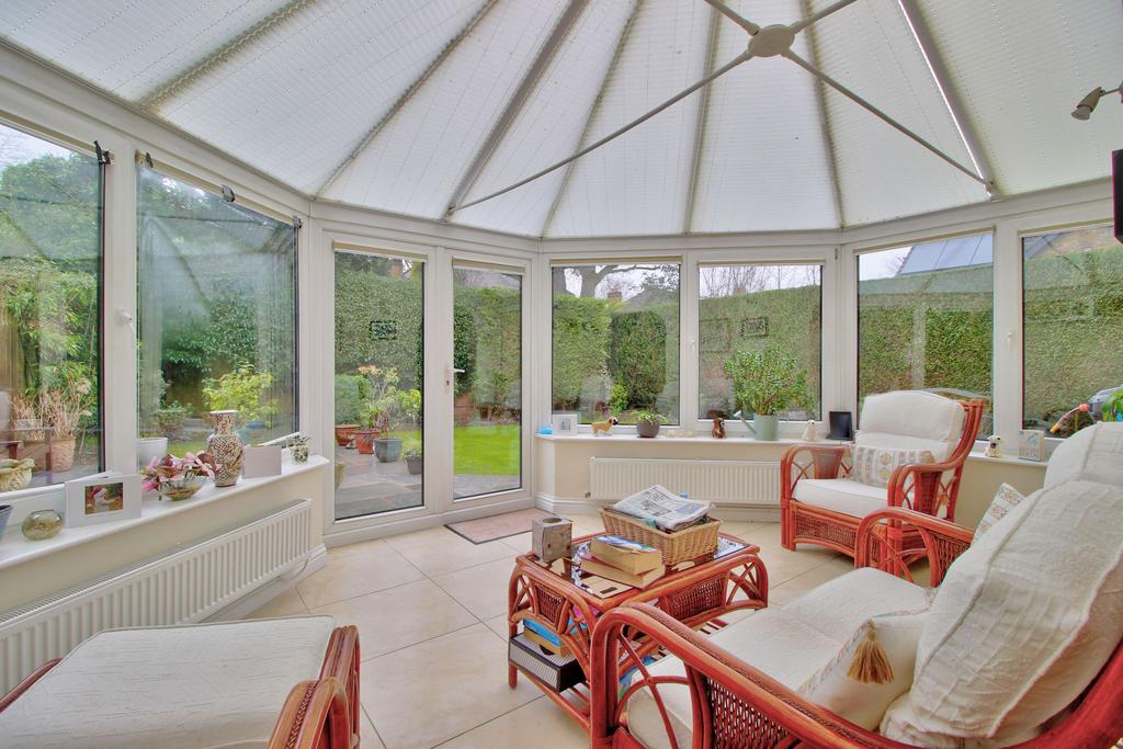Conservatory adjoins kitchen and dining room