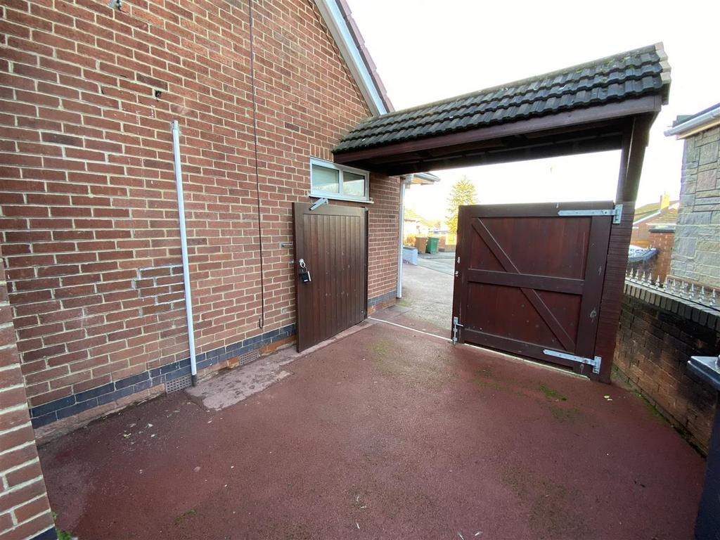 Double gates for security leading to garage