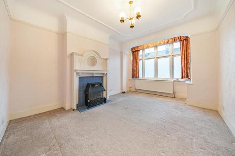 12 Abbott Avenue, London, SW20 8SQ