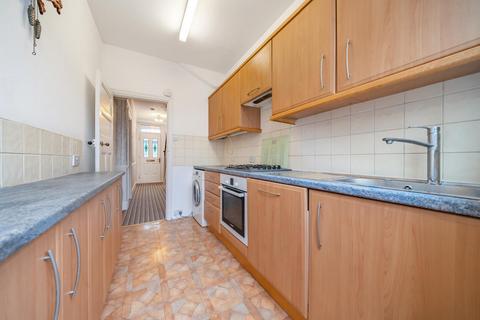 12 Abbott Avenue, London, SW20 8SQ