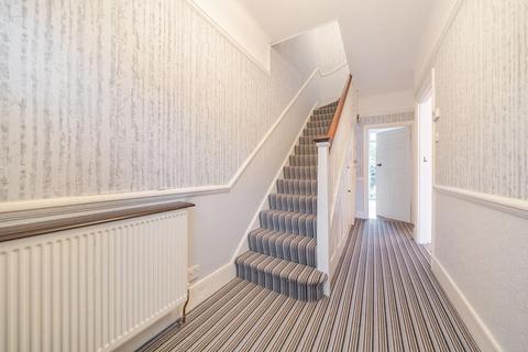 12 Abbott Avenue, London, SW20 8SQ