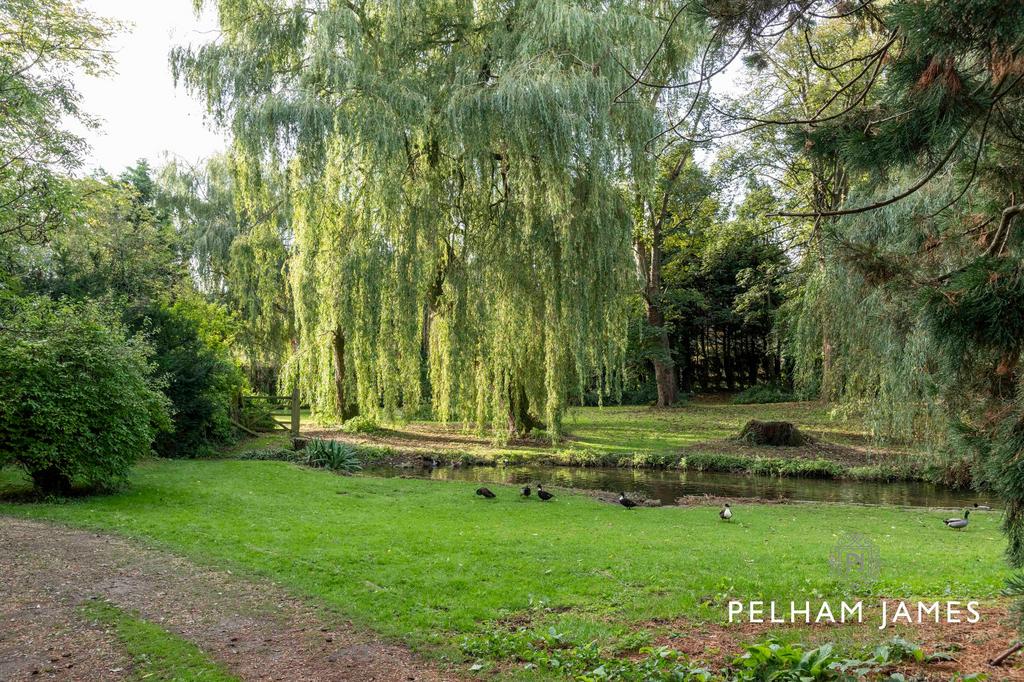 Driveway, Gardens and brook at Greetham House,...