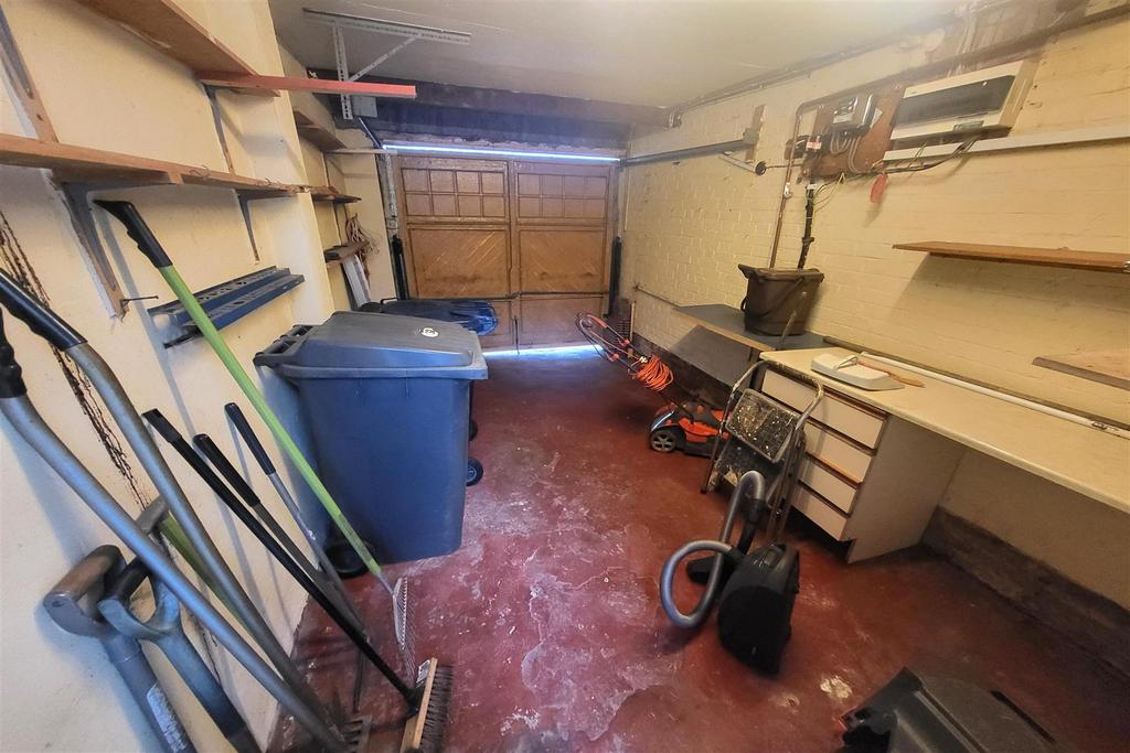 Attached garage with own drive:
