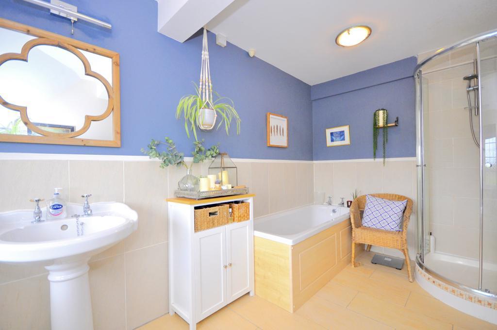 Family bathroom with separate shower