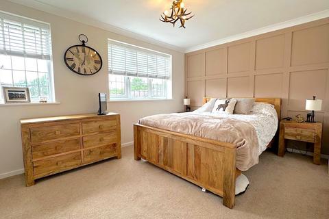 18 Asquith Drive, Cannock, WS11 7GG