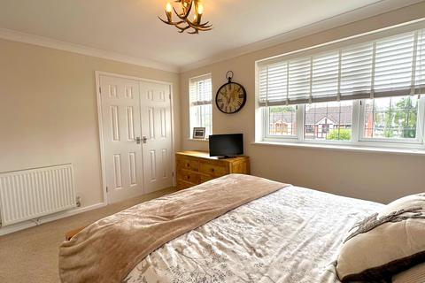 18 Asquith Drive, Cannock, WS11 7GG