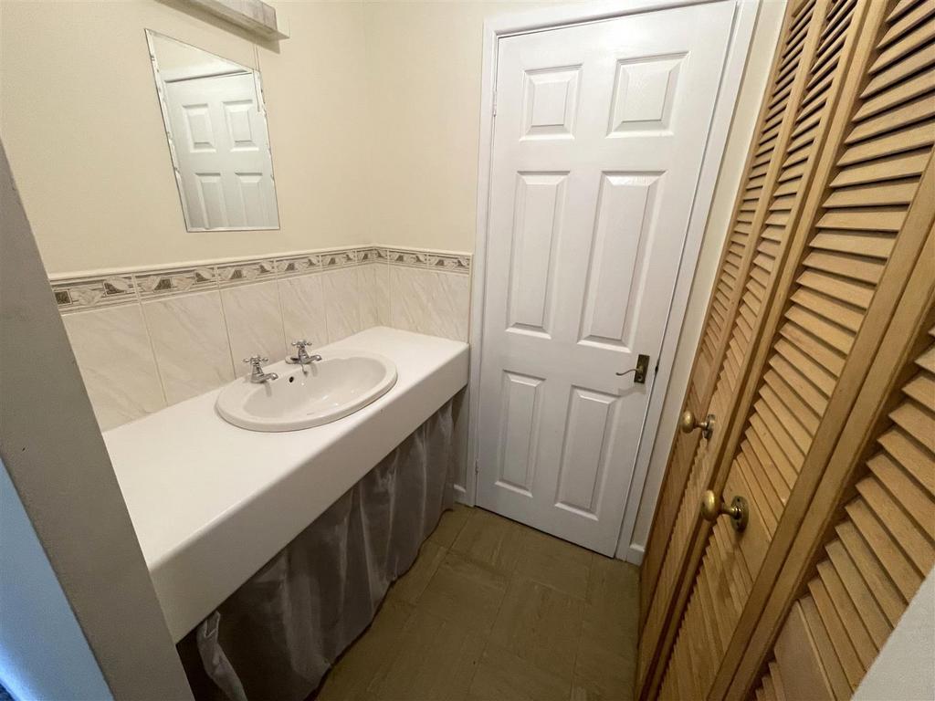 Sink area leading to bathoom.jpg